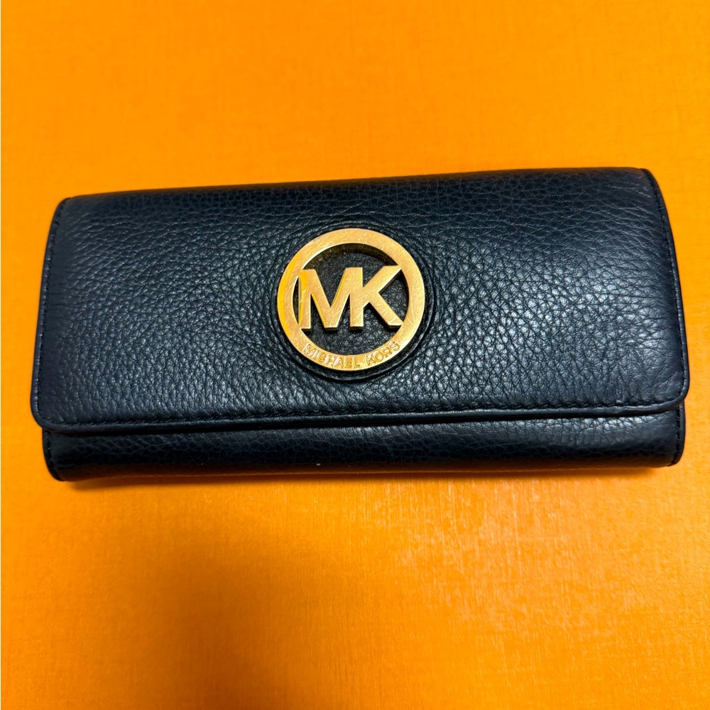 Michael Kors Fulton flap wallet.